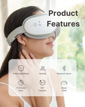 Woman wearing an Eyeris 1 Eye Massager, examining its wellness features listed as massage, heating, and Bluetooth music, in a bright interior setting.